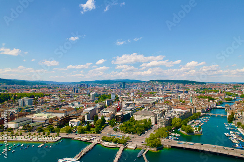 Aerial view of City of Zürich with Quay Bridge, River Limmat, Bellevue Square and the medieval old town on a sunny spring day. Photo taken May 30th, 2022, Zurich, Switzerland.