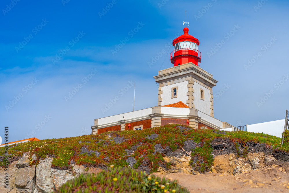 View of the Cabo da Roca Lighthouse. Sintra, Portugal. Portuguese Farol de Cabo da Roca is a cape which forms the westernmost point Eurasian