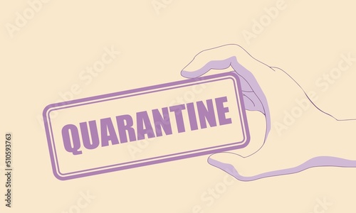 Hand holding label with text quarantine inside.