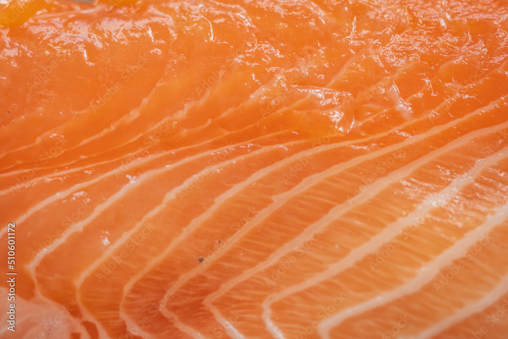 Raw salmon trout fish fillet texture closeup