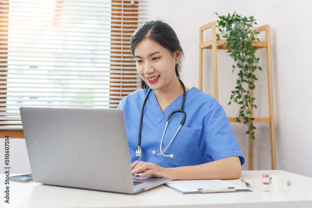 Pet care concept, Female veterinary searching data on laptop to writing prescription for pet Pet care concept, Female veterinary searching data on laptop to writing prescription for pet