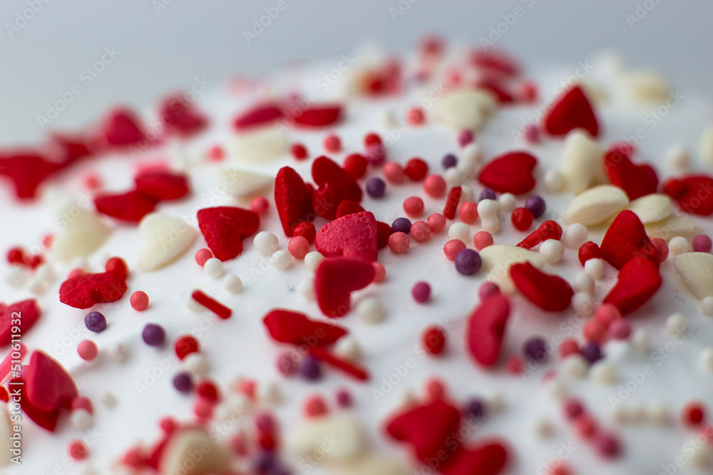 Easter decorated with white sugar glaze, red and white sugar hearts Easter decorated with white sugar glaze, red and white sugar hearts