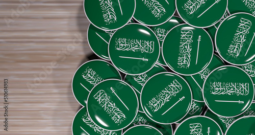3D rendering of SaudiArabia flag pins on a wooden table for politics, support and nationalism