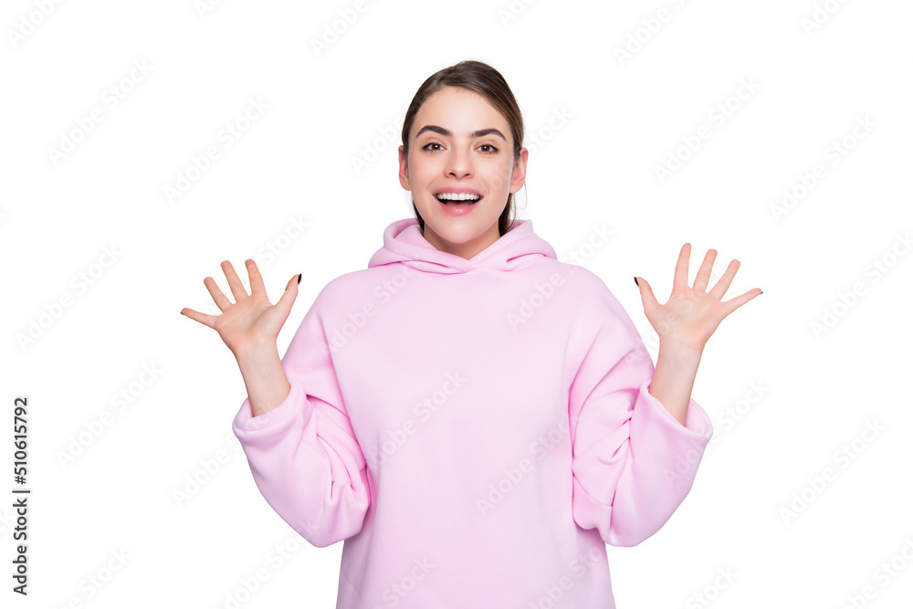 glad young girl in pink hoodie isolated on white background