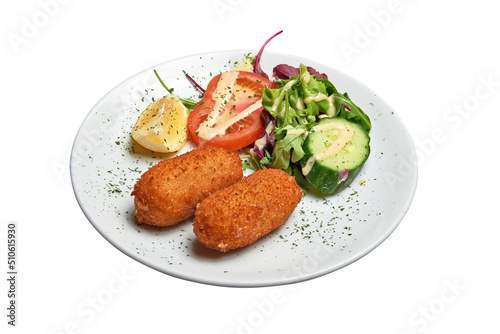 White plate with two Shrimps croquettes ans salad Isolated