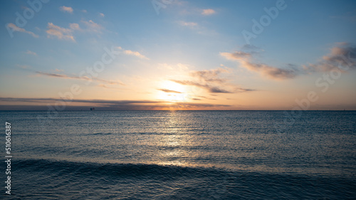 beautiful evening seascape with sea water on the summer beach