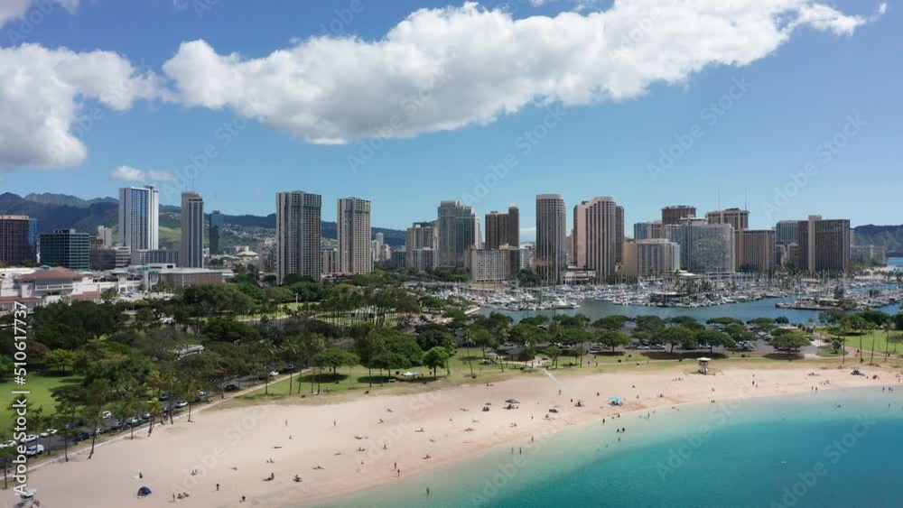 Descending close-up aerial shot of Ala Moana Beach in Honolulu, Hawaii. 4K Descending close-up aerial shot of Ala Moana Beach in Honolulu, Hawaii. 4K