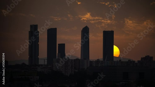 Timelapse of sunset behind the Four Tower in Madrid, Spain 