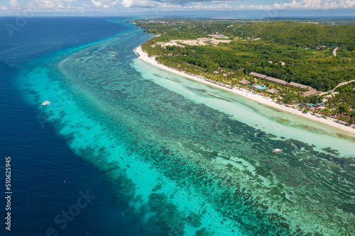 A large reef surrounding the island of Panglao. Aerial of Dumaluan Beach. photo