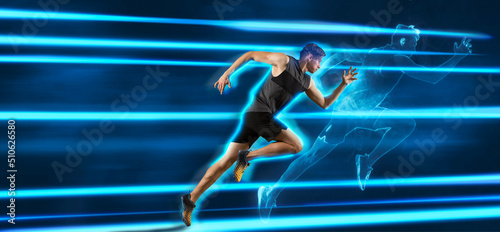 Sporty young man running on blue neon background
