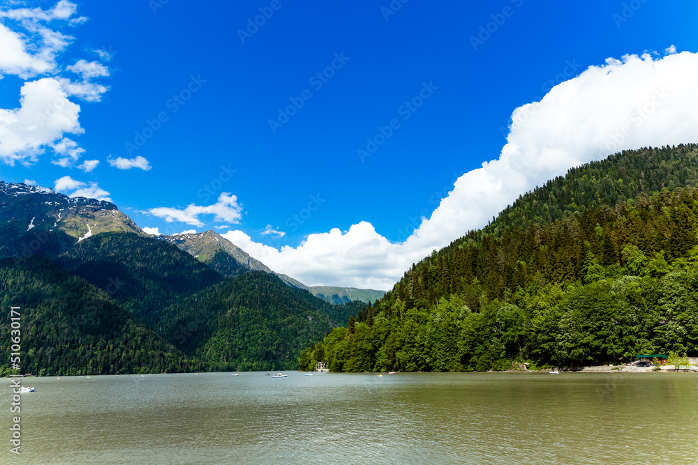 Landscape of the lake against the background of mountains.
