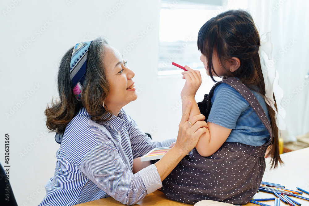 Asian portrait, grandchild granddaughter grandma grandmother and granddaughter happily join in activities to enhance skills for grandchildren Asian portrait, grandchild granddaughter grandma grandmother and granddaughter happily join in activities to enhance skills for grandchildren