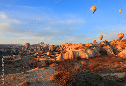 Mountain landscape with hot air balloons in Goreme, Cappadocia,Turkey