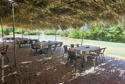 acheron river greece restaurant and cafe beside to the river in summer season photo