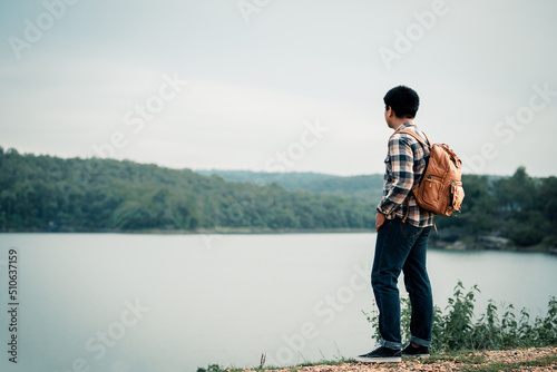 Wallpaper Mural Young man backpack traveling on the holiday. selective and soft focus. Torontodigital.ca