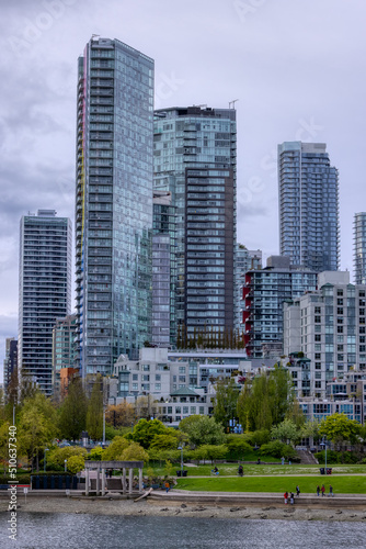 Residential Home Buildings in Downtown Vancouver  British Columbia  Canada. False Creek. Cloudy Sky Background