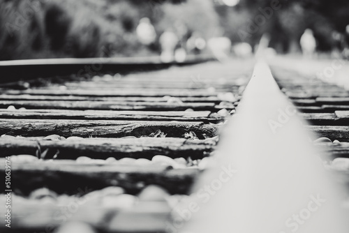 Black & White dramatic Railway track with extreme close up and fading into distance. photo