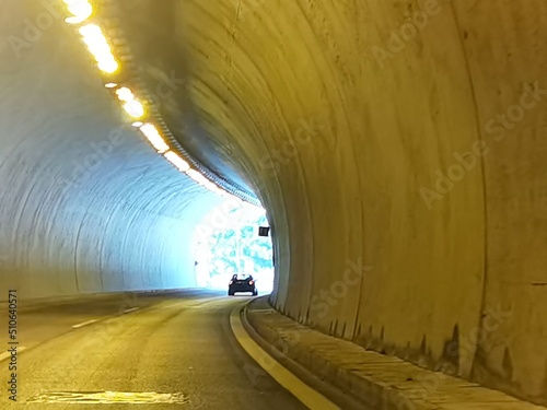 tunnel on egnatia highway greece dark lights traffic signals on the road photo