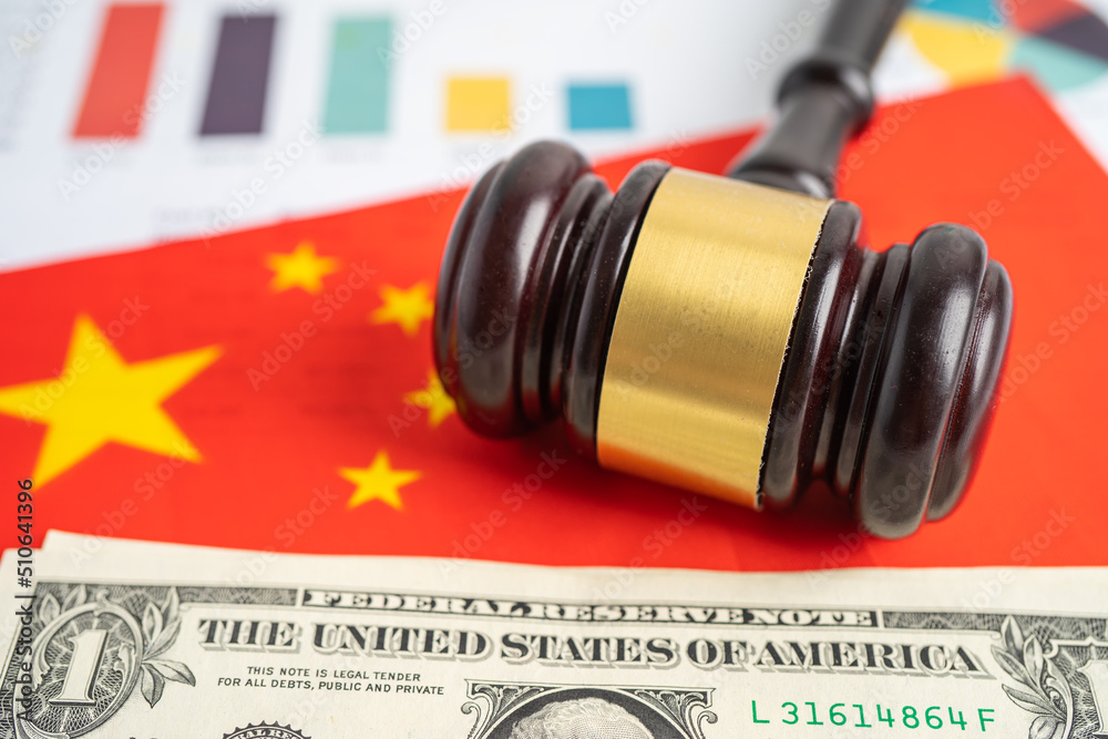 Gavel on china flag with graph for judge lawyer. Law and justice court concept. Gavel on china flag with graph for judge lawyer. Law and justice court concept.