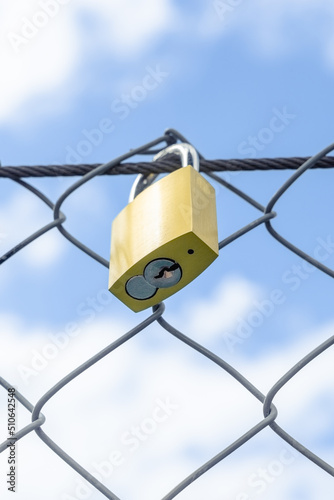 Wallpaper Mural Close-up of a padlock and its lock on the river bridge Torontodigital.ca