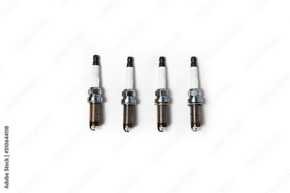 Four car candles on a white background. Top view, flat lay Four car candles on a white background. Top view, flat lay