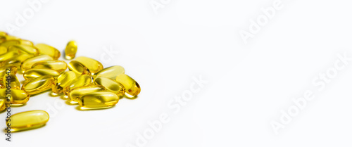 Vitamins in capsules fish oil, omega 3 and vitamin D on a white background. Banner.