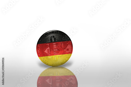 bitcoin with the national flag of germany on the white background. bitcoin mining concept.