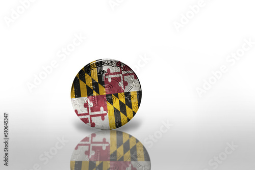 bitcoin with the flag of maryland state on the white background. bitcoin mining concept.