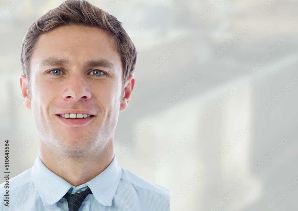 Composite image of caucasian businessman against blurred background with copy space Composite image of caucasian businessman against blurred background with copy space