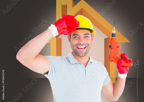Caucasian male worker holding drilling machine against house icon and copy space on grey background