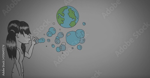 Girl blowing bubbles of earth globe against copy space on grey background