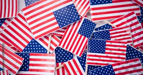 Close up view of multiple miniature american flags with copy space