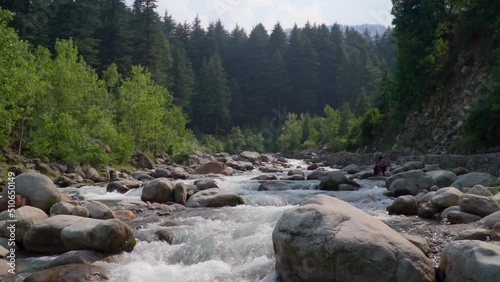 Water flow. Mountain river. Himalaya Himachal. Slow motion. photo