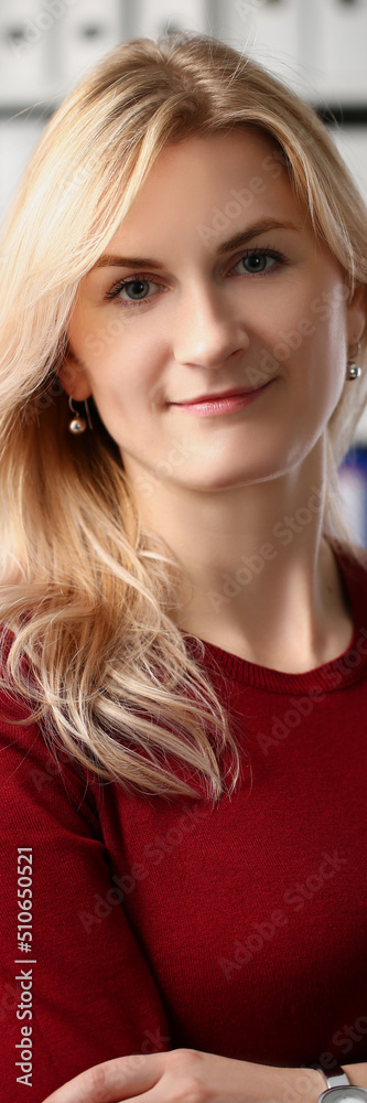 Presentable office worker smiling and posing for picture with crossed arms Presentable office worker smiling and posing for picture with crossed arms