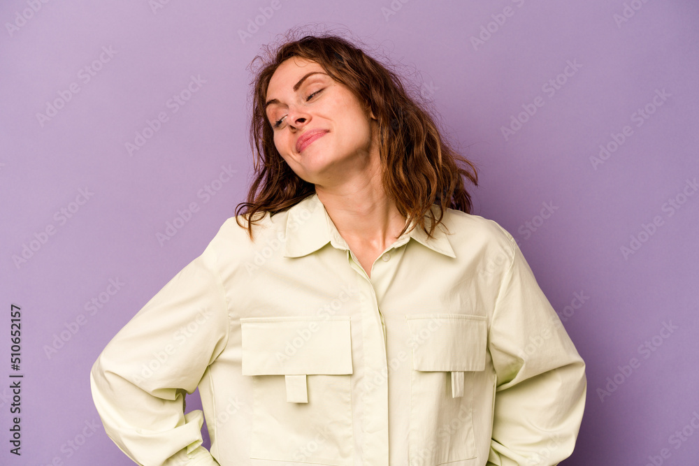 Young caucasian woman isolated on purple background dreaming of achieving goals and purposes Young caucasian woman isolated on purple background dreaming of achieving goals and purposes