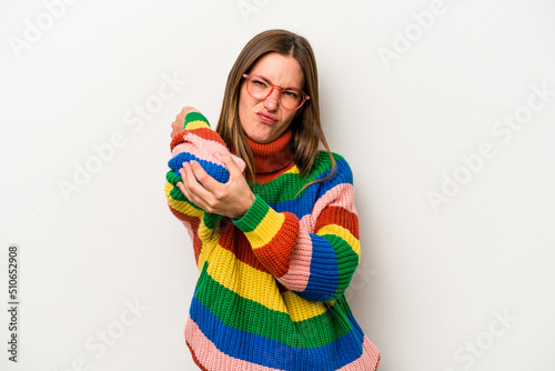 Young caucasian pregnant woman isolated on white background having a neck pain due to stress, massaging and touching it with hand.