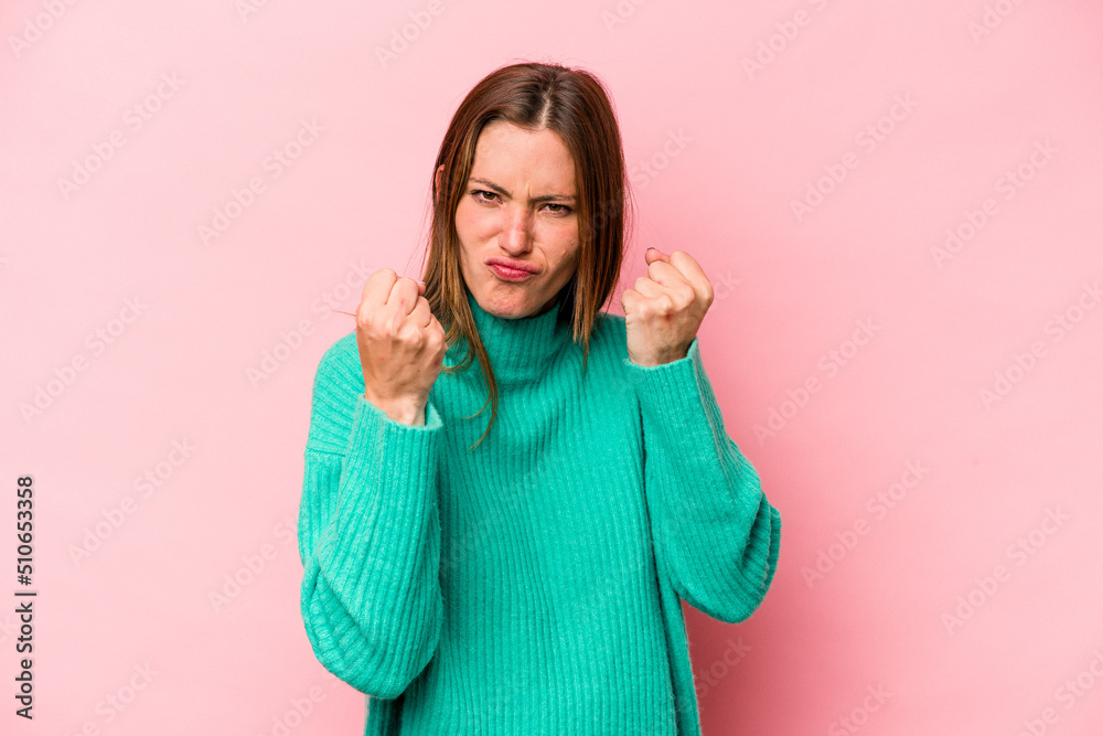 Young caucasian pregnant woman isolated on white background upset screaming with tense hands. Young caucasian pregnant woman isolated on white background upset screaming with tense hands.