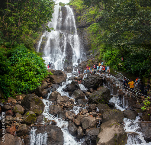 AMBOLI, September 2021: Tourists enjoy rain day at Amboli water falls on Maharashtra-Goa boarder, India.