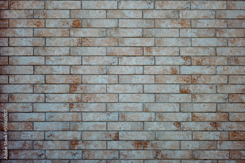 Beige brick tiles texture background backdrop.