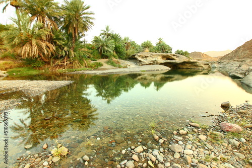 the place is beautiful   with mountains  rocks   small fish