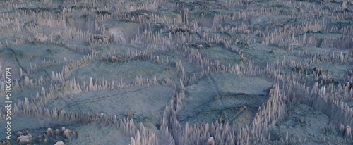 Snowy desert with ice stalactites background. Futuristic tundra covered with 3d render snow and lawns of frozen icicles. Alien landscape covered with ashes and crystals
