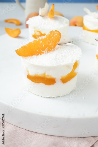 Mini cheesecake with apricot jam and coconut