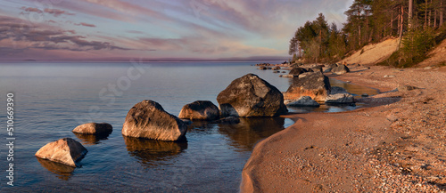 Sunset on Lake Kolvitskoye, Kola Peninsula, Murmansk region, Russia.	
