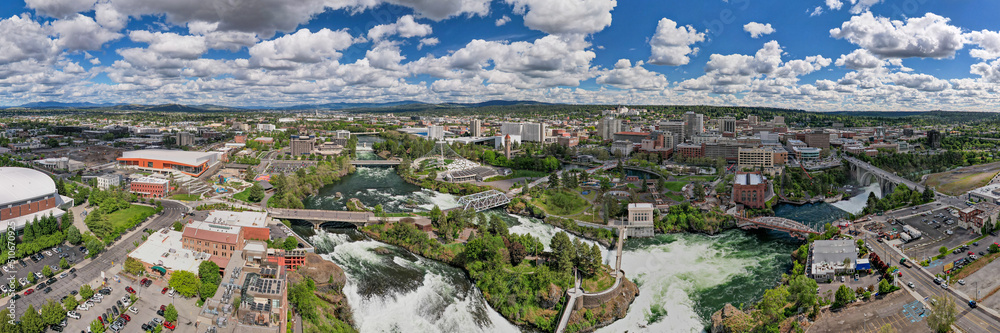 Spokane, WA skyline cityscape panorama with pavilion and Spokane River during the day, United States