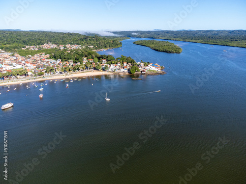 Beautiful fishing village with its boats on a river beach