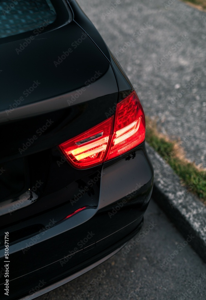 Rear tail light on a black car