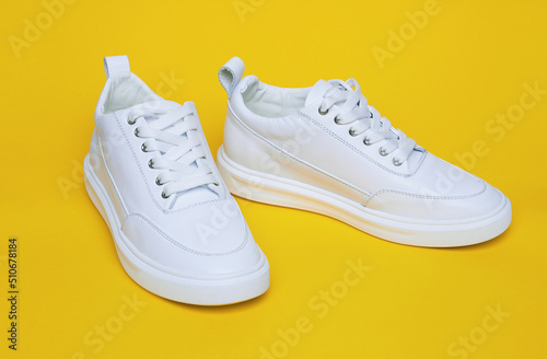 White Sneaker on yellow