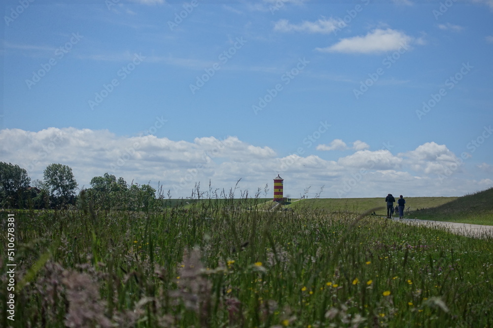Fototapeta premium Leuchtturn Pilsum Ostfriesland - der