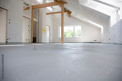 freshly cured concrete screed on construction site in loft in a family house