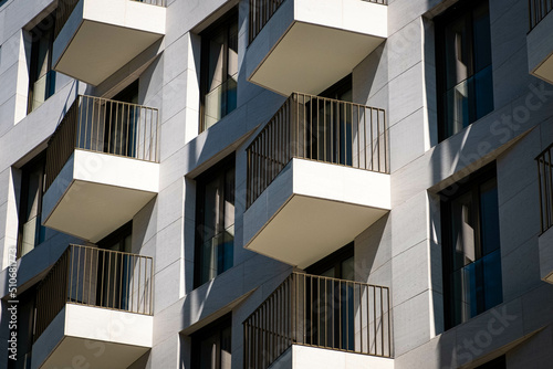 Tela balconies on apartment building facade, residential real estate